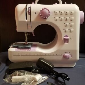 Compact Pink and White Sewing Machine